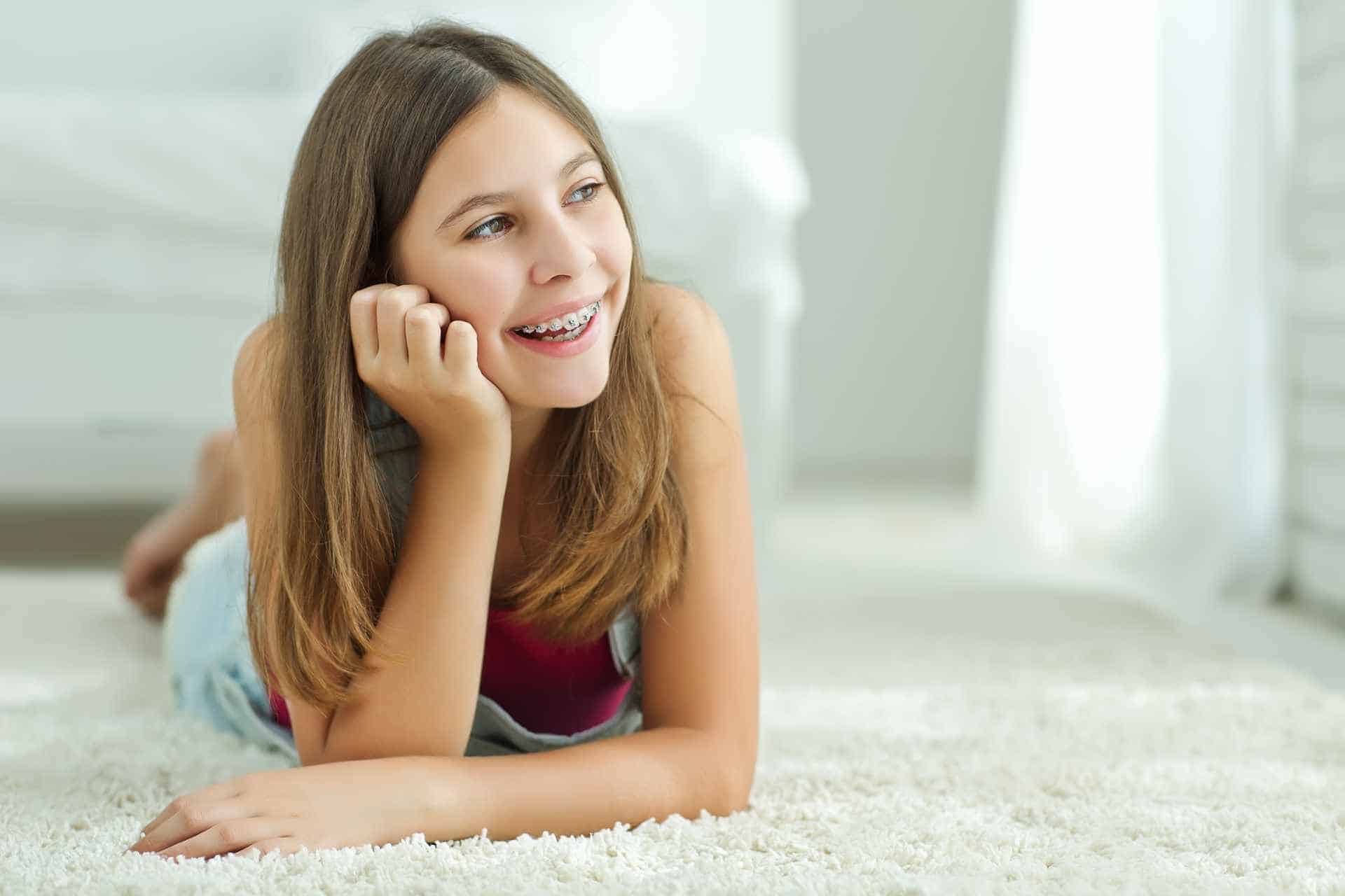 Girl smiling with braces