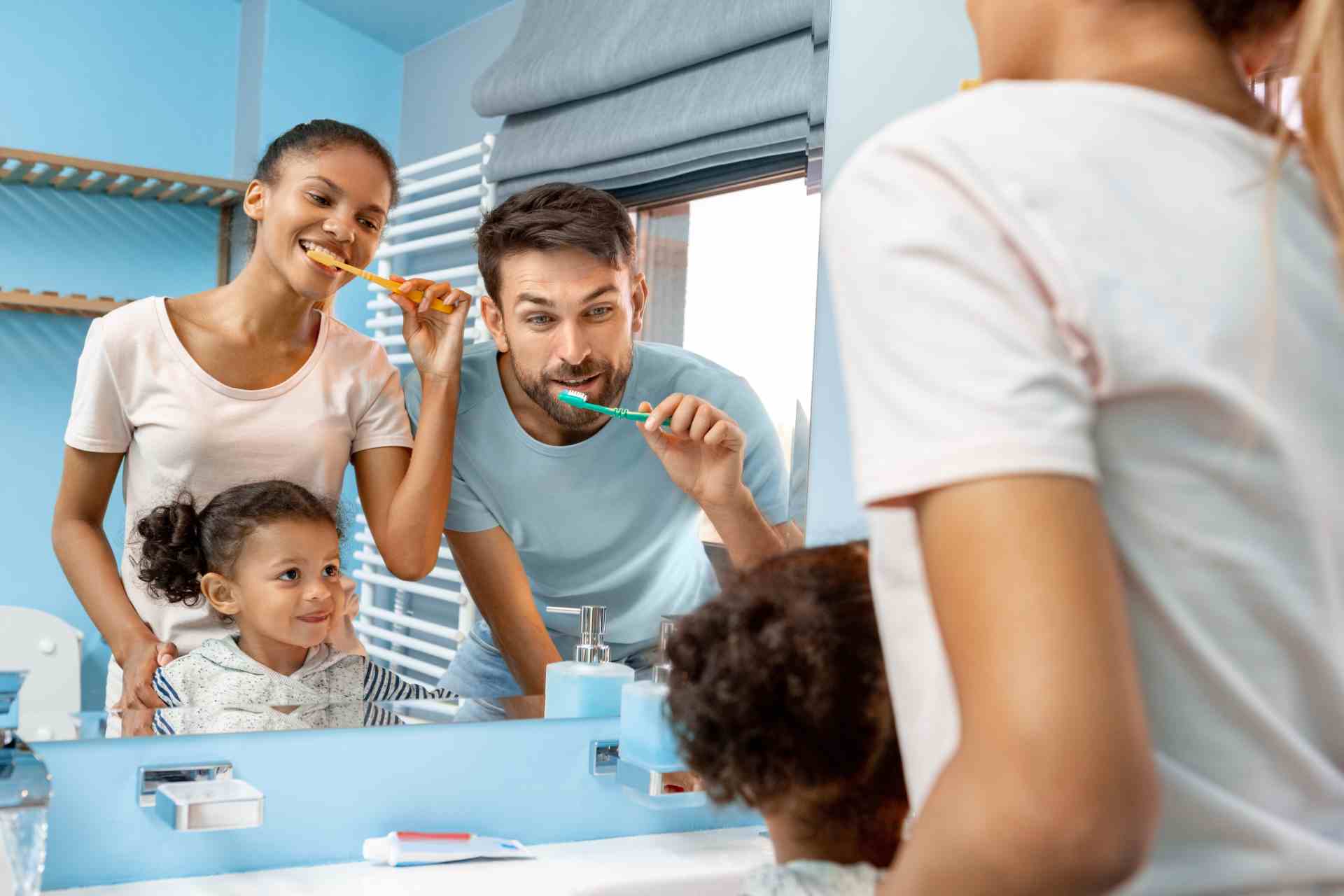 Family brushing teeth